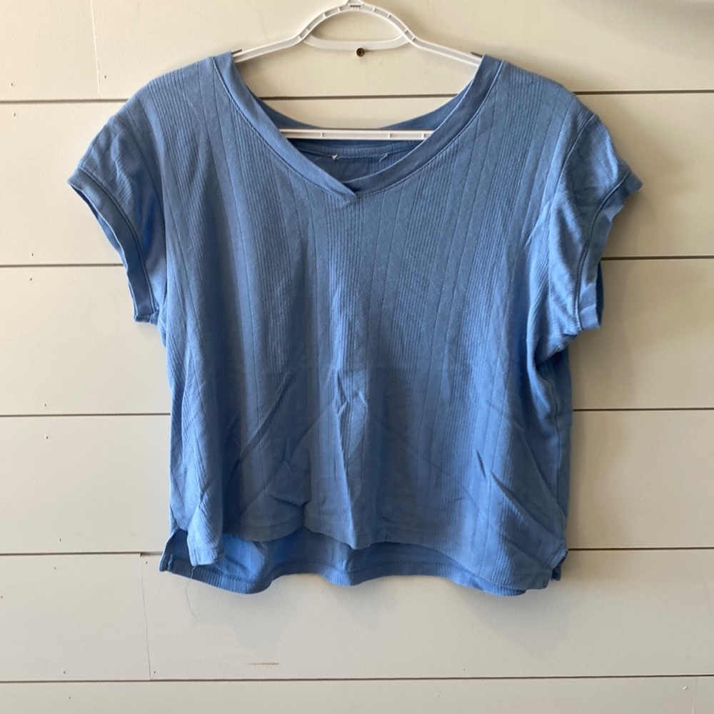 BLUE T. Short sleeve blue t-shirt.
